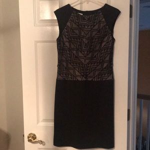 Very classy black and tan dress.